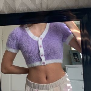 Isabelle’s cabinet purple fluffy top